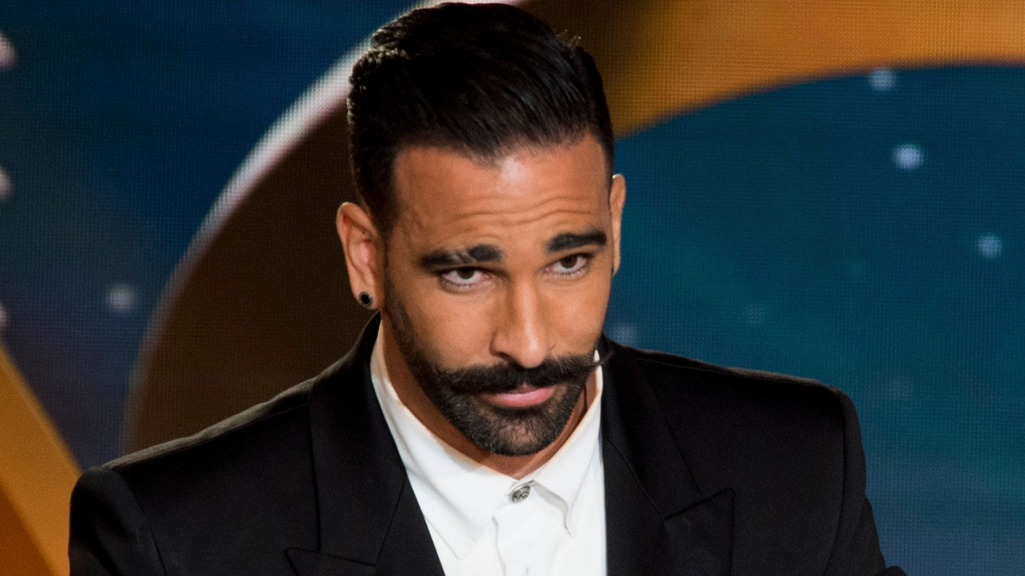 Adil Rami déjeune avec Jean-Paul Belmondo... et tacle au passage Pamela Anderson ?