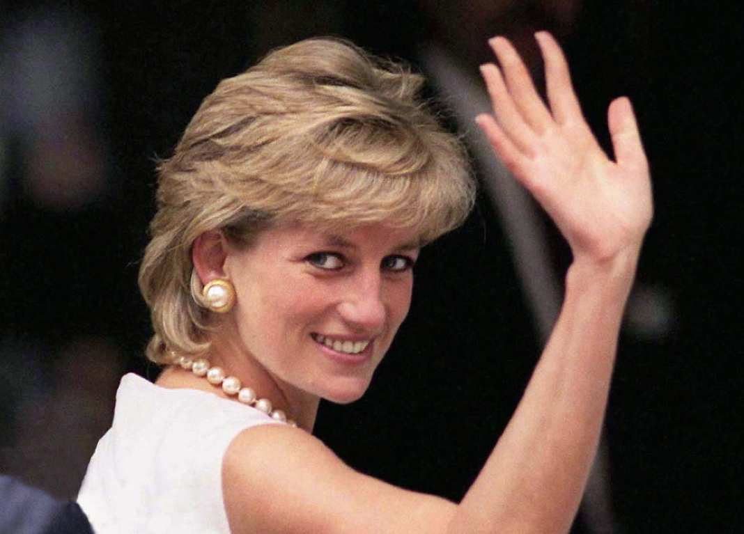  Lady Diana et les princes Harry et William en août 1995 @ Johnny Eggitt/AFP