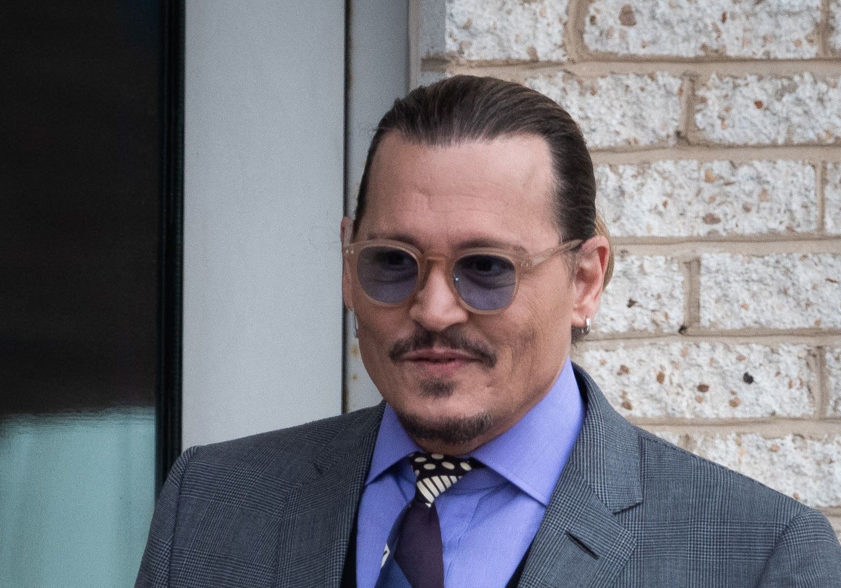 Johnny Depp vs Amber Heard : en plein procès, une femme affirme que l'acteur est le père de son bébé