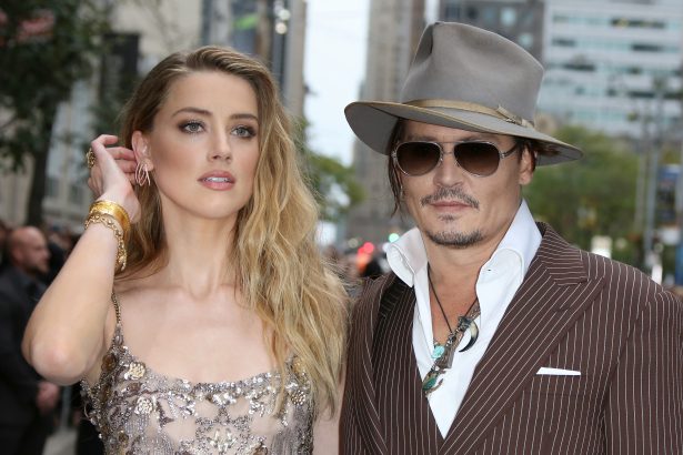  Amber Heard et Johnny Depp prennent la pose @GettyImages